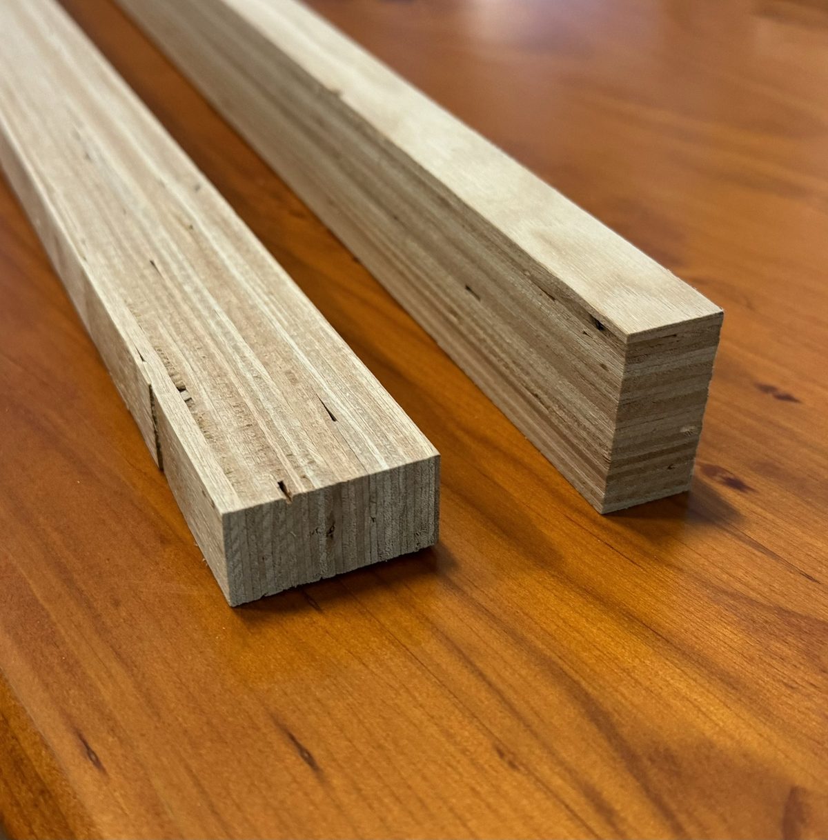 LVL kiln sticks stacked between layers of laminated veneer lumber
